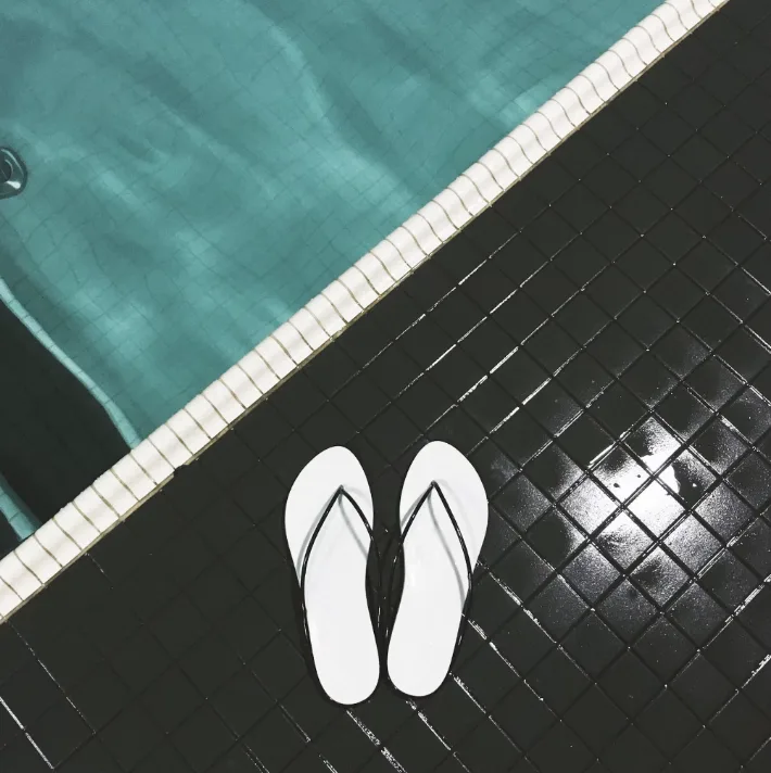 Slipper mit individuellem Logo auf der Sohle